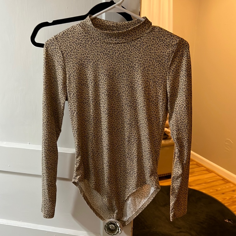 Brand new never worn cheetah bodysuit
